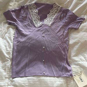 Brand new purple j.ing blouse  size medium but fits like a small